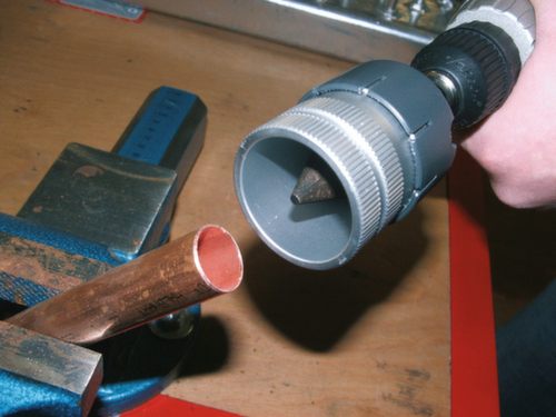 Adapter voor pijpontbramer