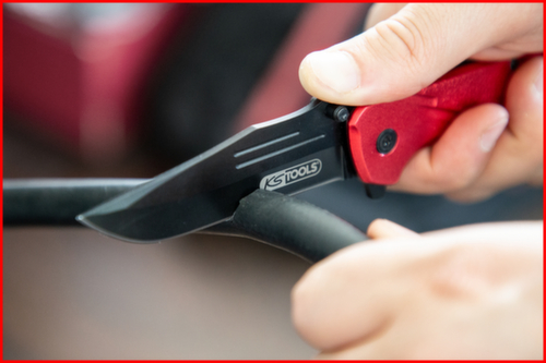 Vouwmes met slot en riemsnijder